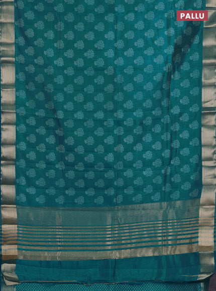 Semi raw silk saree teal blue with allover floral butta prints and zari woven border
