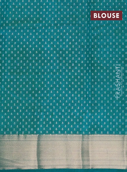 Semi raw silk saree teal blue with allover floral butta prints and zari woven border