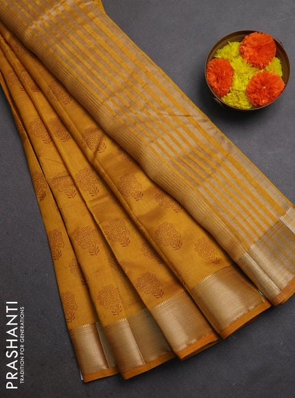 Semi raw silk saree dark mustard with allover floral butta prints and zari woven border