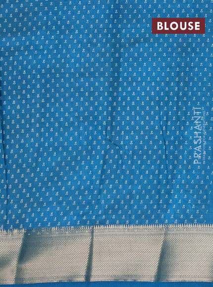 Semi raw silk saree peacock blue with allover floral butta prints and zari woven border