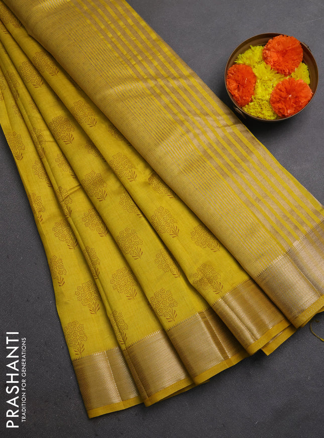 Semi raw silk saree mustard yellow with allover floral butta prints and zari woven border