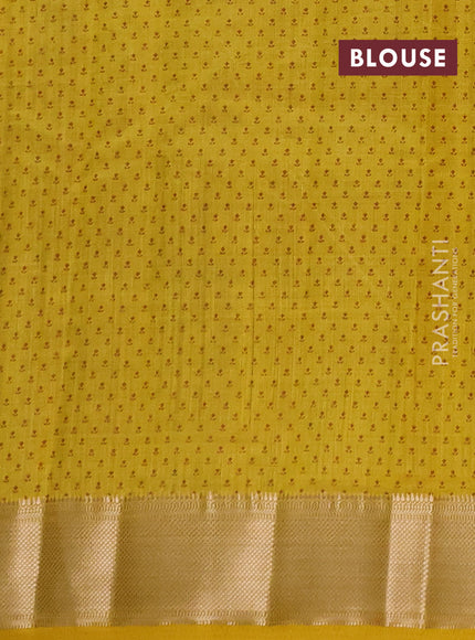Semi raw silk saree mustard yellow with allover floral butta prints and zari woven border