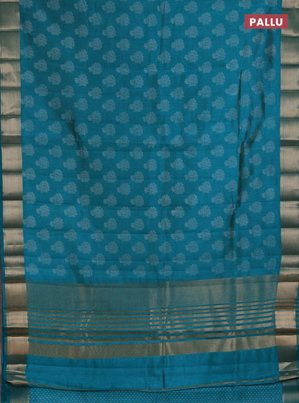 Semi raw silk saree teal green with allover floral butta prints and zari woven border
