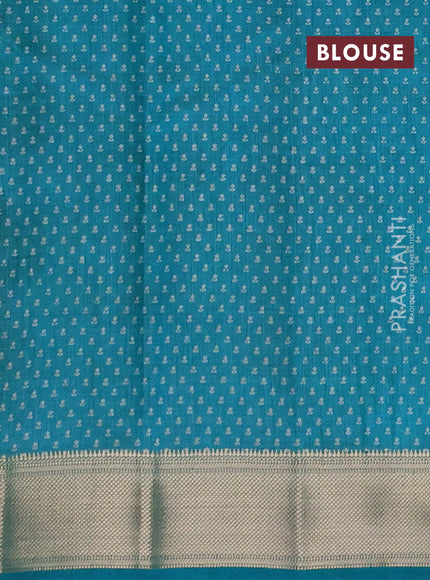 Semi raw silk saree teal green with allover floral butta prints and zari woven border