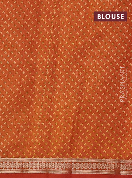 Semi raw silk saree rustic orange with allover floral butta prints and small zari woven border