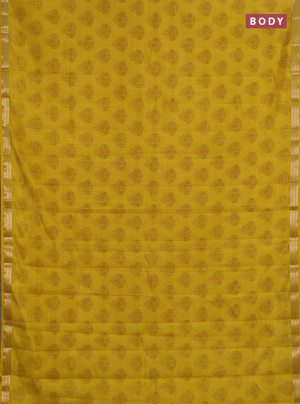 Semi raw silk saree mustard yellow shade with allover floral butta prints and small zari woven border