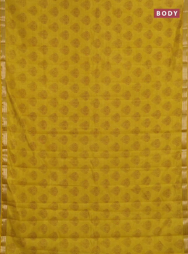 Semi raw silk saree mustard yellow shade with allover floral butta prints and small zari woven border