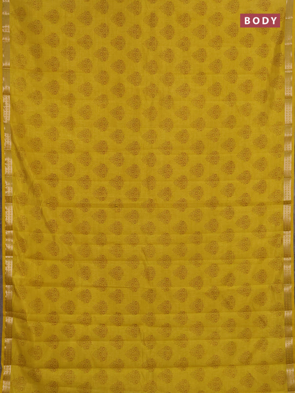 Semi raw silk saree mustard yellow shade with allover floral butta prints and small zari woven border