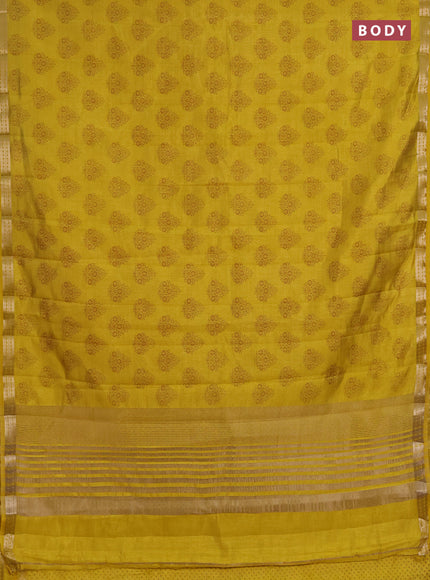 Semi raw silk saree mustard yellow shade with allover floral butta prints and small zari woven border