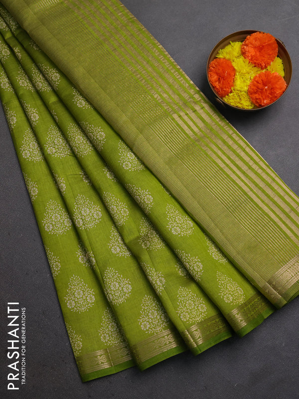 Semi raw silk saree light green with allover floral butta prints and small zari woven border