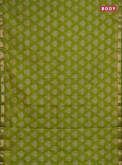 Semi raw silk saree light green with allover floral butta prints and small zari woven border