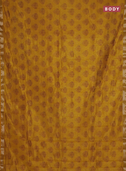 Semi raw silk saree mustard yellow with allover floral butta prints and small zari woven border
