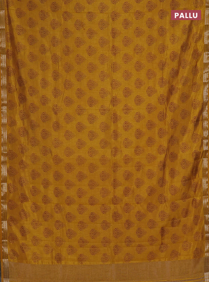 Semi raw silk saree mustard yellow with allover floral butta prints and small zari woven border