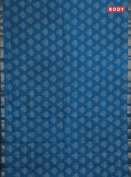 Semi raw silk saree teal blue with allover floral butta prints and small zari woven border