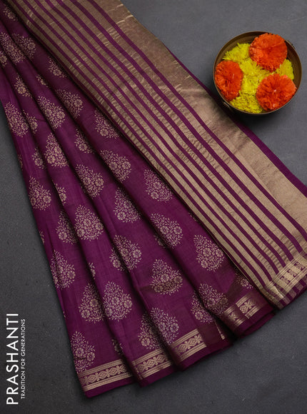 Semi raw silk saree wine shade with allover floral butta prints and small zari woven border