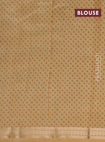 Semi raw silk saree sandal with allover floral butta prints and small zari woven border