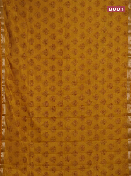 Semi raw silk saree dark mustard with allover floral butta prints and small zari woven border