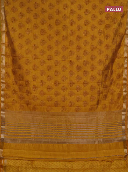 Semi raw silk saree dark mustard with allover floral butta prints and small zari woven border