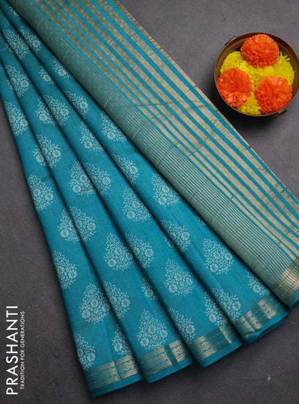 Semi raw silk saree teal green with allover floral butta prints and small zari woven border