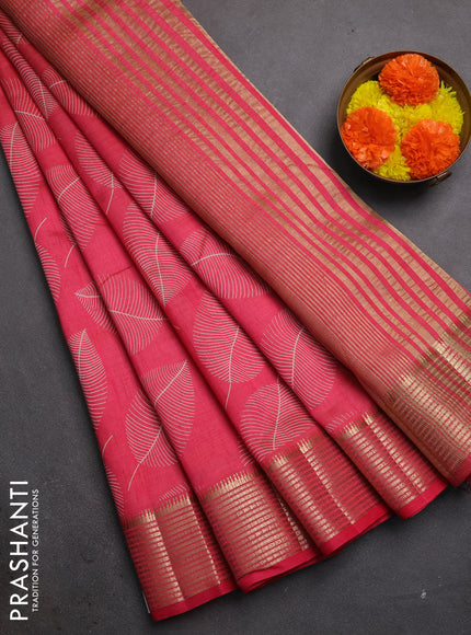 Semi raw silk saree pink shade with allover prints and zari woven border