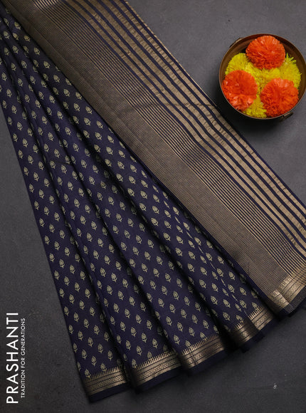 Semi raw silk saree navy blue with allover butta prints and zari woven border