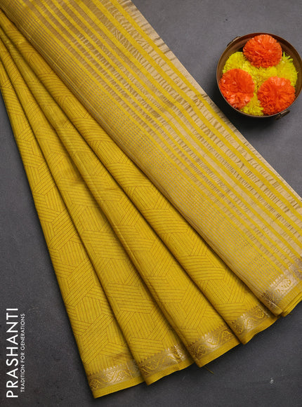 Semi raw silk saree mustard yellow with allover geometric prints and zari woven border