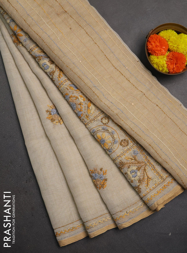Linen saree beige with embroidery buttas and embroidery pallu & border
