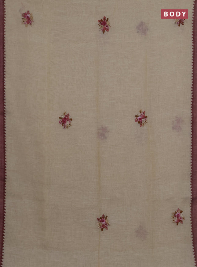 Linen saree beige and mauve pink with embroidery buttas and embroidery pallu