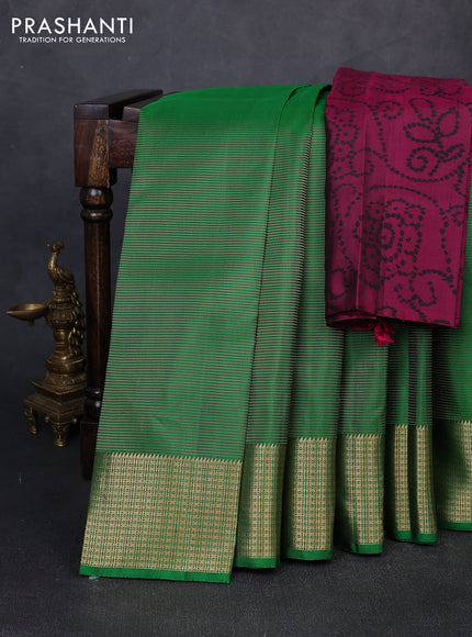 Pure soft silk saree green and magenta pink with allover zari woven buttas and zari woven border
