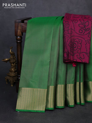 Pure soft silk saree green and magenta pink with allover zari woven buttas and zari woven border