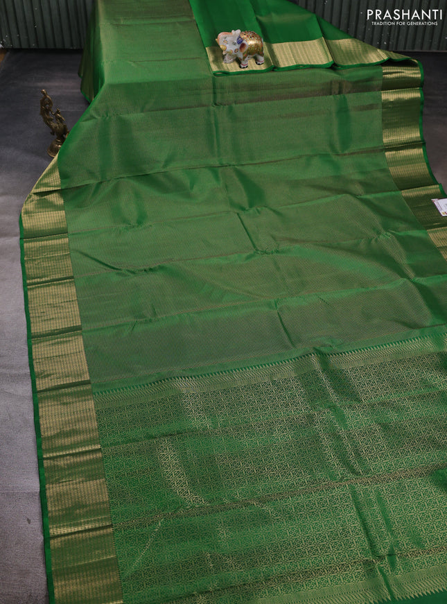 Pure soft silk saree green and magenta pink with allover zari woven buttas and zari woven border
