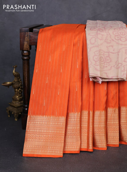 Pure soft silk saree orange and beige with allover zari woven buttas and zari woven border