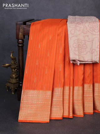 Pure soft silk saree orange and beige with allover zari woven buttas and zari woven border