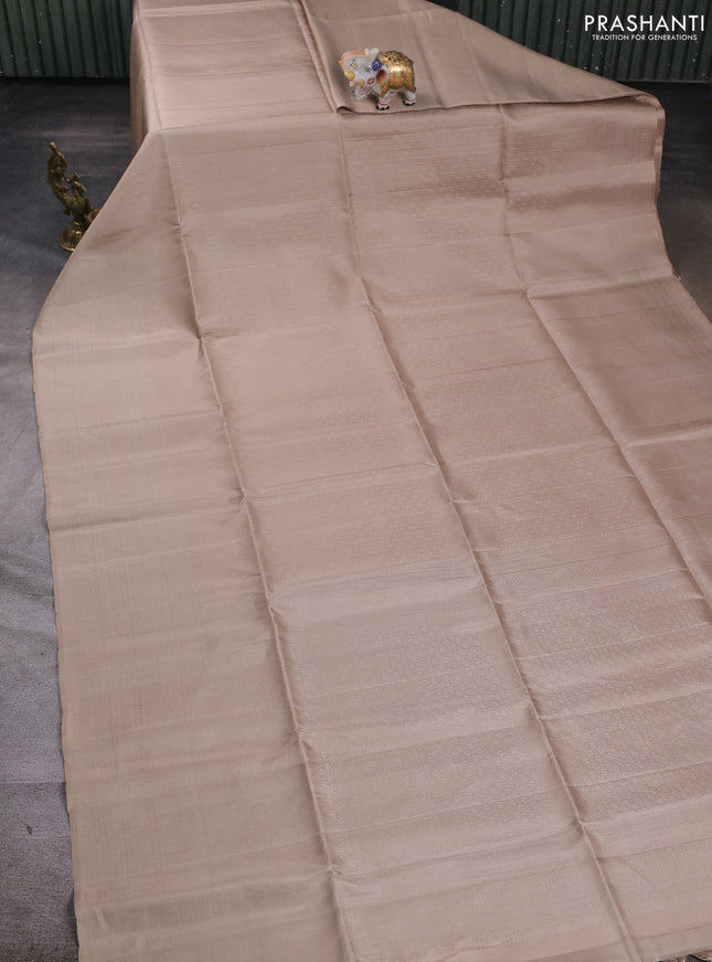 Pure soft silk saree beige and magenta pink with allover zari weaves & buttas and zari woven border