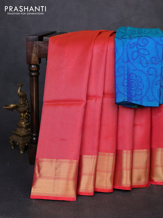 Pure soft silk saree dual shade of pinkish orange and teal blue with allover zari woven brocade weaves and zari woven border
