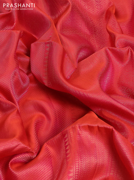 Pure soft silk saree dual shade of pinkish orange and teal blue with allover zari woven brocade weaves and zari woven border