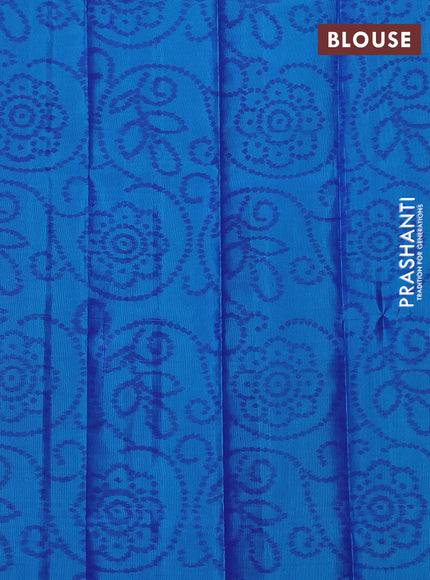 Pure soft silk saree dual shade of pinkish orange and teal blue with allover zari woven brocade weaves and zari woven border