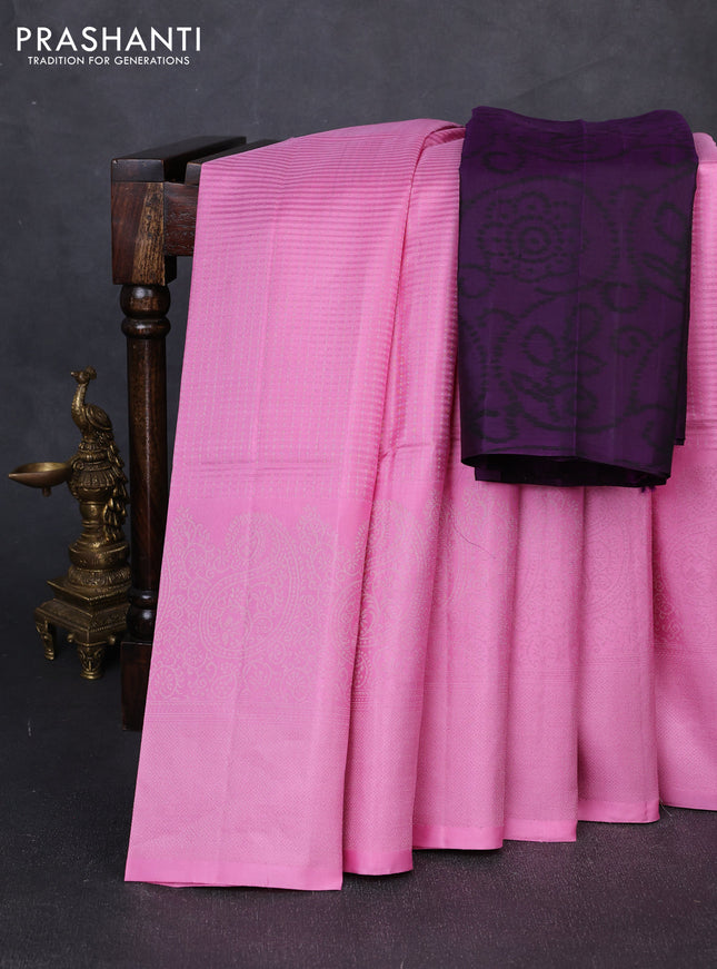 Pure soft silk saree light pink and purple with allover zari weaves and zari woven border