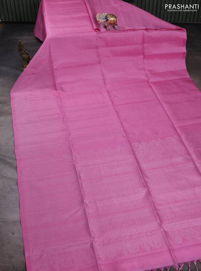 Pure soft silk saree light pink and purple with allover zari weaves and zari woven border