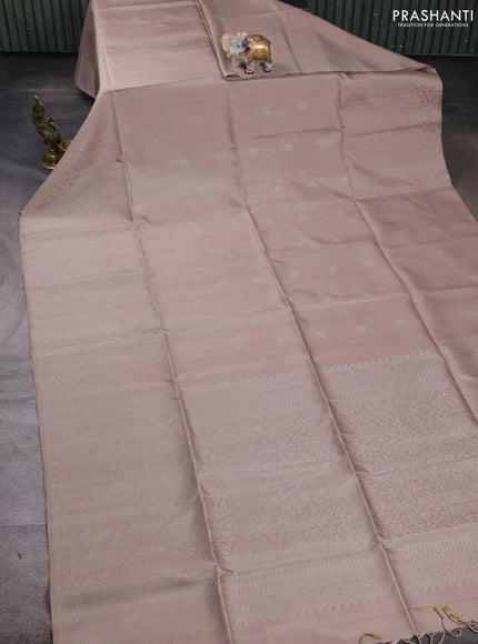 Pure soft silk saree beige and beige with allover zari woven biuttas and zari woven border