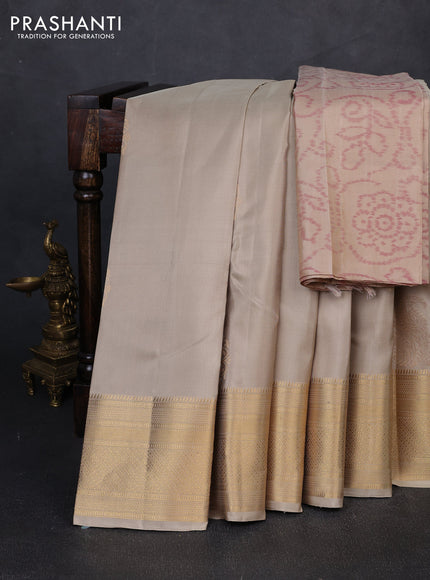 Pure soft silk saree beige and beige shade with paisley zari woven buttas and zari woven border