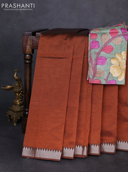 Mangalgiri silk cotton saree rust shade and green shade with plain body and temple design silver zari woven border