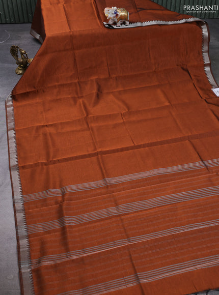 Mangalgiri silk cotton saree rust shade and green shade with plain body and temple design silver zari woven border