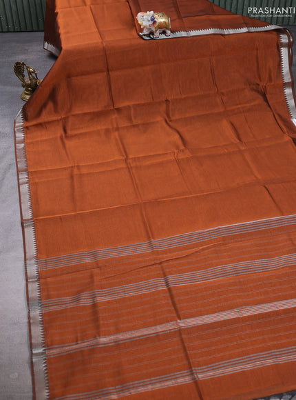 Mangalgiri silk cotton saree rust shade and green with plain body and temple design silver zari woven border