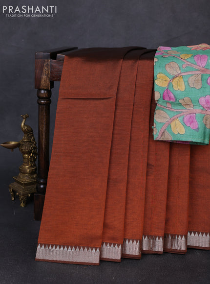 Mangalgiri silk cotton saree rust shade and green with plain body and temple design silver zari woven border
