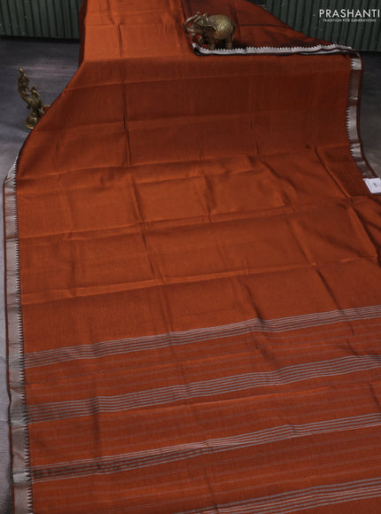 Mangalgiri silk cotton saree rust shade and green with plain body and temple design silver zari woven border
