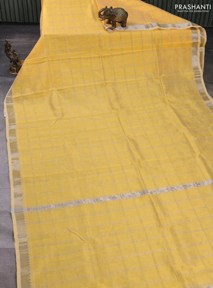 Mangalgiri silk cotton saree pale yellow and elephant grey with allover silver zari checked pattern and temple design silver zari woven border