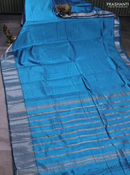 Mangalgiri silk cotton saree light blue and orange with plain body and temple design silver zari woven border