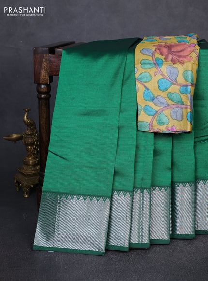 Mangalgiri silk cotton saree green and mustard yellow with plain body and temple design silver zari woven border