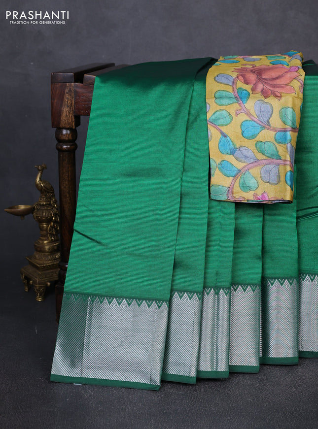 Mangalgiri silk cotton saree green and mustard yellow with plain body and temple design silver zari woven border